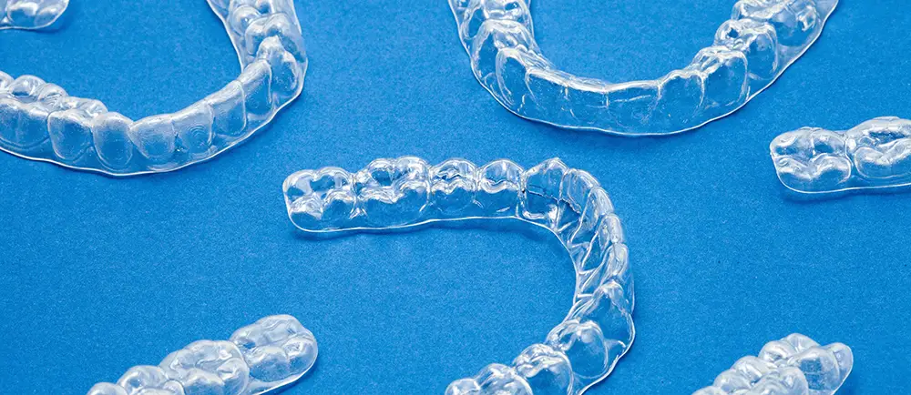 Confident patient smiling after Invisalign treatment with Platinum Provider near Hampton Coliseum Virginia