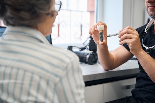 Dental Implant Specialist and Patient